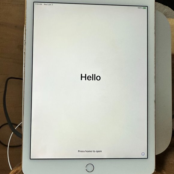 iPad Air silver barely used and in excellent condition. A few minor scuffs.